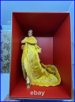 2022 Barbie Signature Guo Pei Barbie Doll Wearing Golden-Yellow Gown In Hand