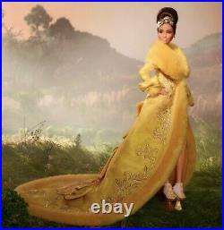 Barbie Signature Guo Pei Barbie Doll Wearing Golden Yellow Gown In Hand
